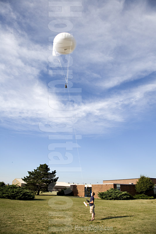 Blimp in the clouds